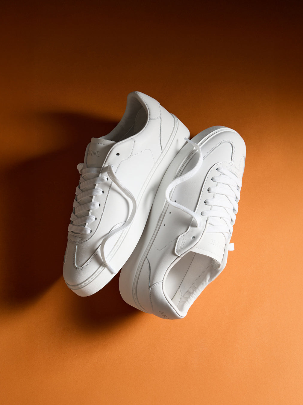 Tennis Trainer in Triple White